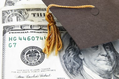   mini graduation cap on money, by SalFalk